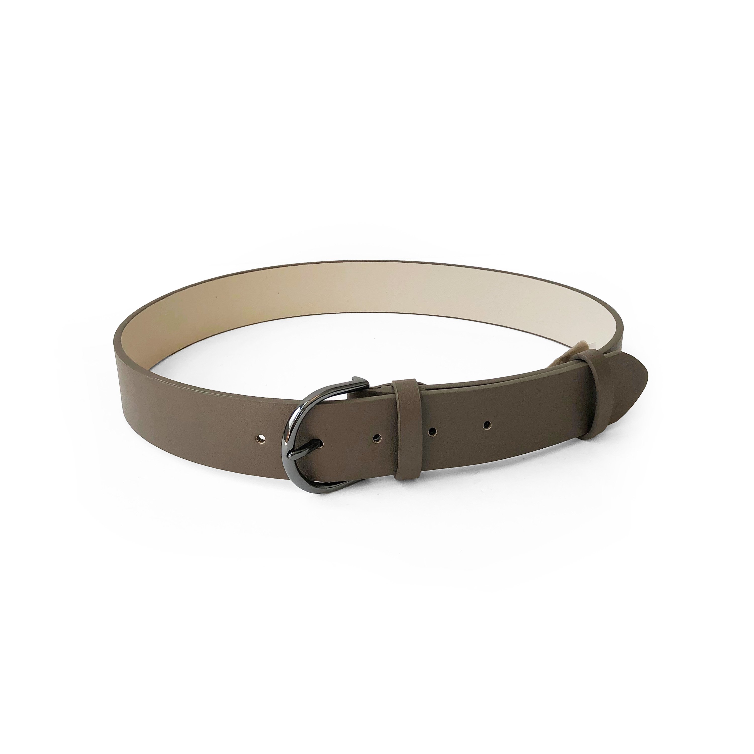 Ladies belt featuring a rounded gunmetal buckle on a matte finish synthetic leather strap, showcasing elegance and style.