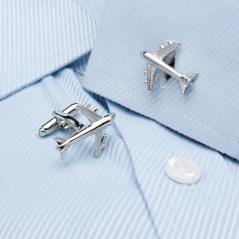 A pair of luxurious Air Bus cufflinks made from titanium alloy with chrome plating, featuring a detailed Air Bus design, presented in a stylish box.