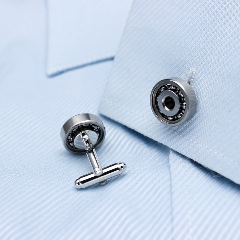 Stylish Bearing Cufflinks made from titanium alloy with real bearings, presented in a hard-sided gift box.