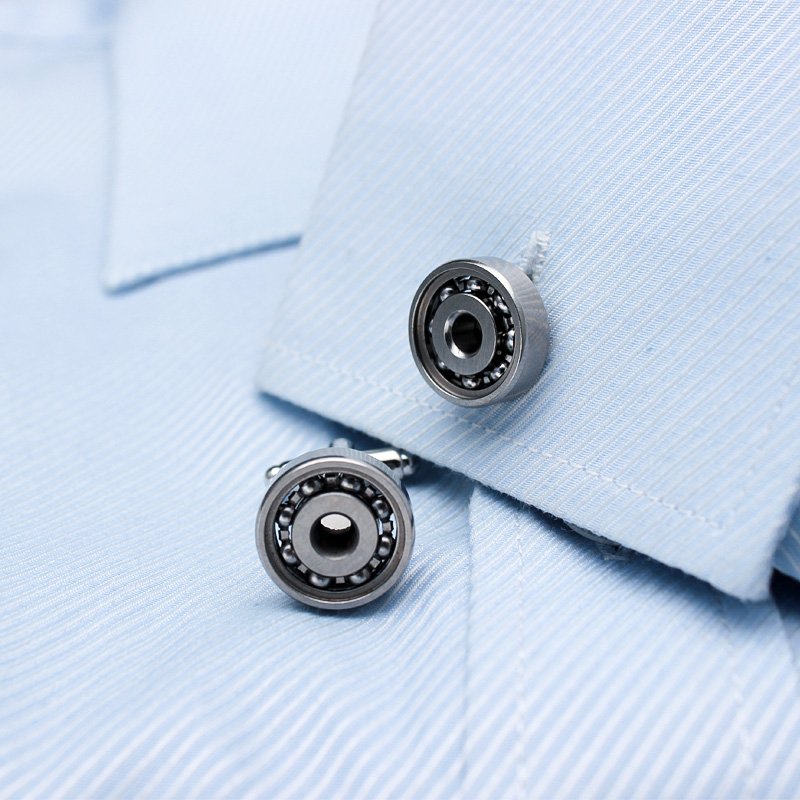 Stylish Bearing Cufflinks made from titanium alloy with real bearings, presented in a hard-sided gift box.