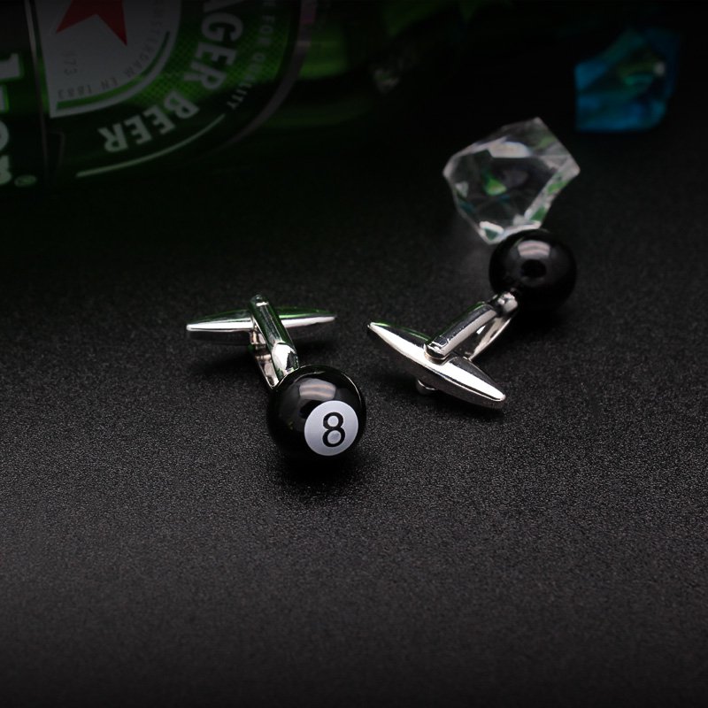 A pair of stylish billiards-themed cufflinks made from titanium alloy, featuring a vivid design, displayed in a hard-sided presentation box.