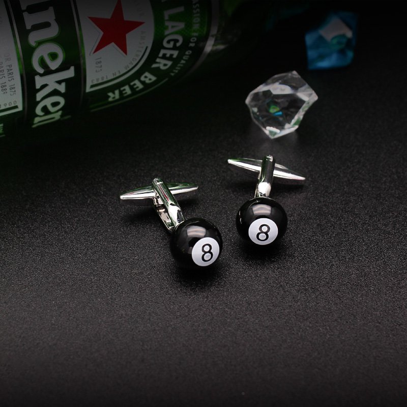 A pair of stylish billiards-themed cufflinks made from titanium alloy, featuring a vivid design, displayed in a hard-sided presentation box.