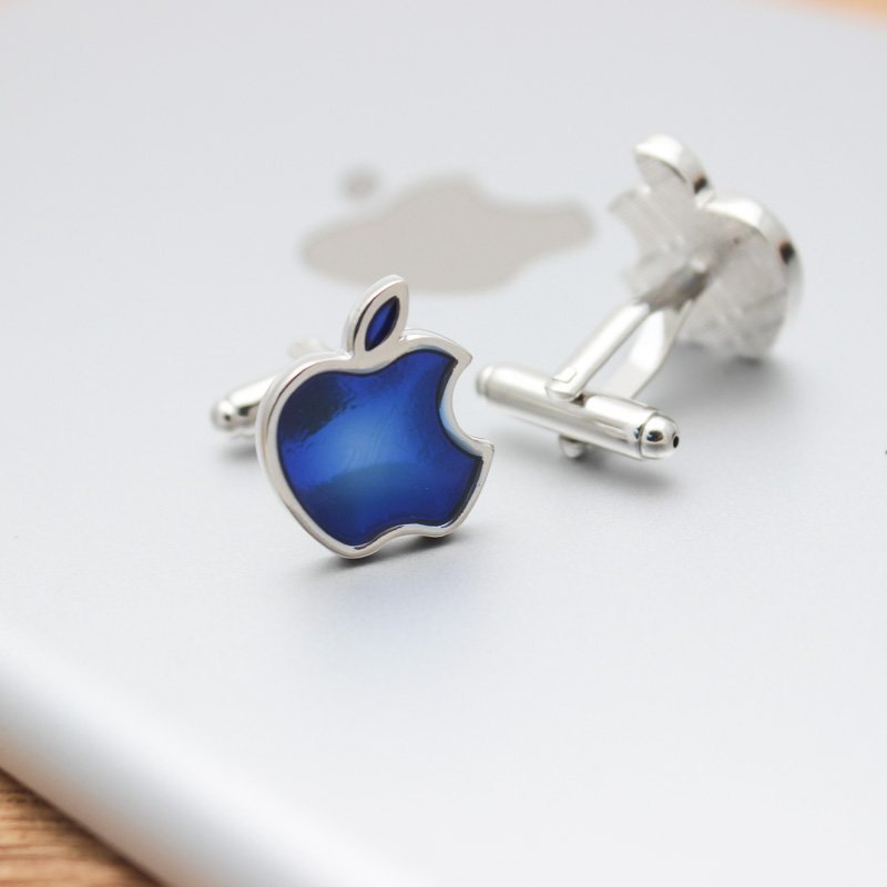 A pair of elegant blue apple cufflinks made from titanium alloy, showcasing a unique design perfect for formal wear.