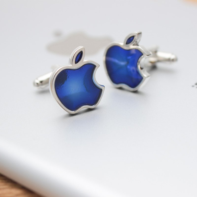 A pair of elegant blue apple cufflinks made from titanium alloy, showcasing a unique design perfect for formal wear.