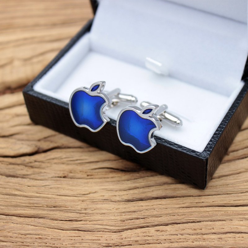 A pair of elegant blue apple cufflinks made from titanium alloy, showcasing a unique design perfect for formal wear.