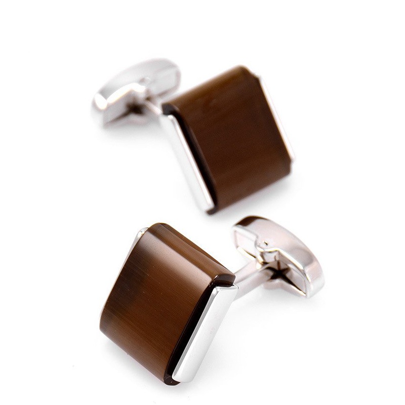 A pair of elegant Brown Opal Cufflinks featuring a unique design with a stainless steel base and rhodium plating, presented in a stylish gift box.