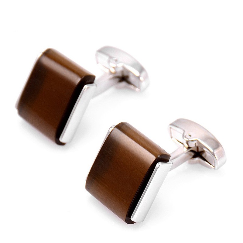 A pair of elegant Brown Opal Cufflinks featuring a unique design with a stainless steel base and rhodium plating, presented in a stylish gift box.