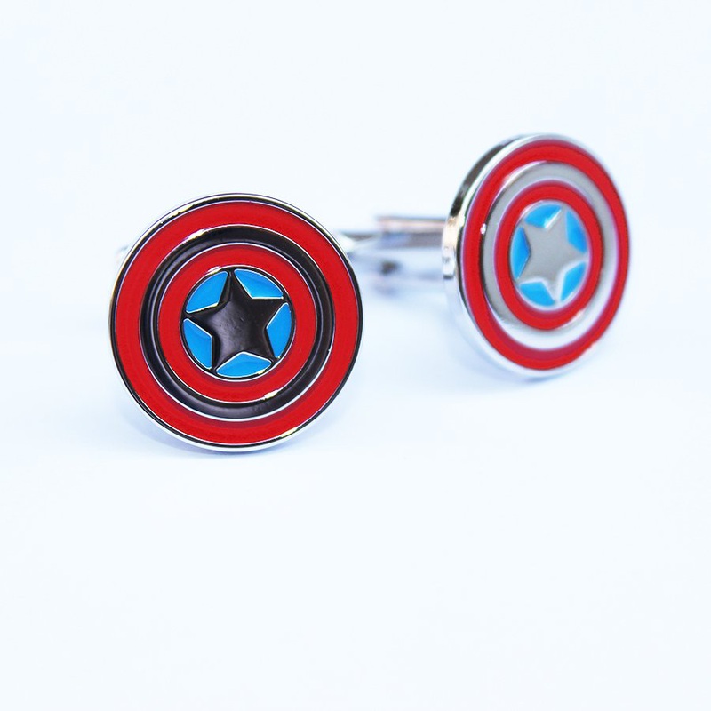 A pair of Captain America Shield Cufflinks made of stainless steel with a rhodium plated finish, displayed in a hard-sided presentation box.