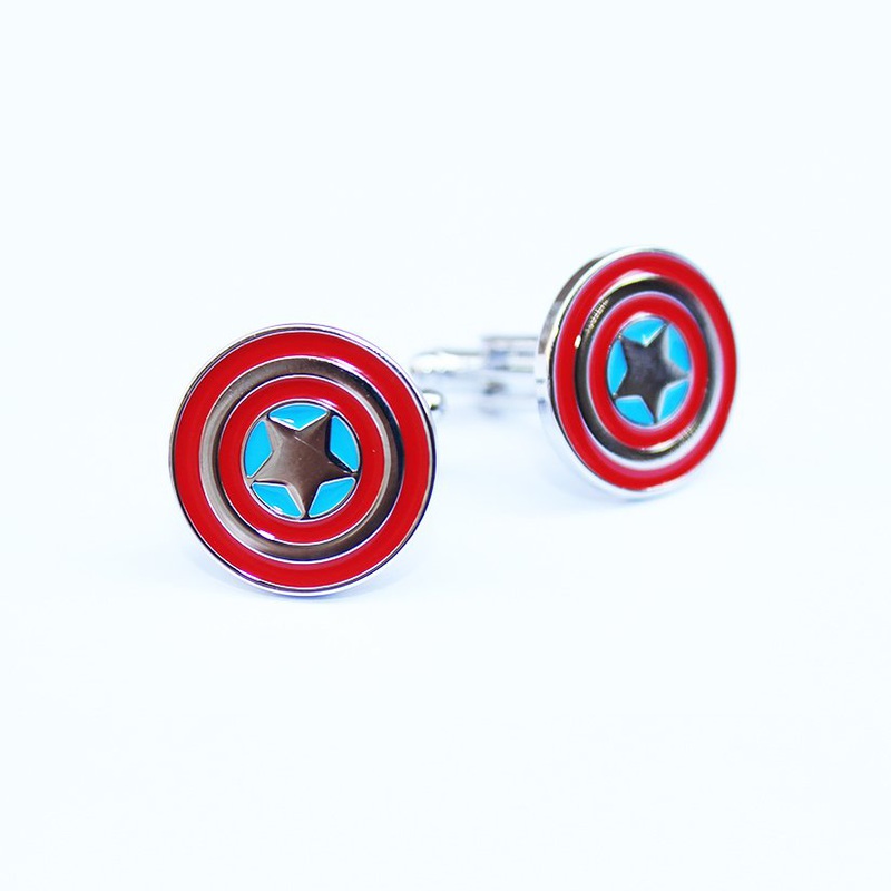 A pair of Captain America Shield Cufflinks made of stainless steel with a rhodium plated finish, displayed in a hard-sided presentation box.