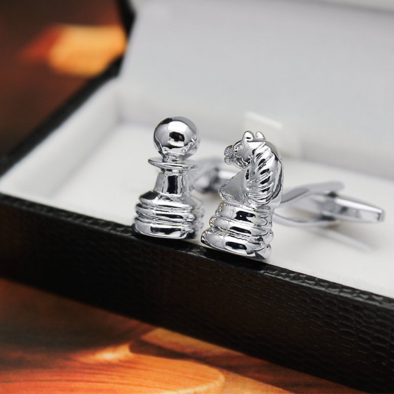 Stylish Chess Cufflinks made from titanium alloy, featuring intricate chess piece designs, presented in a hard-sided gift box.