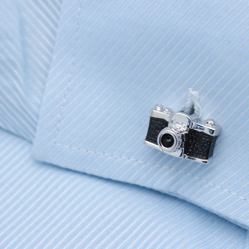 A pair of stylish Classic Camera Cufflinks made from titanium alloy, featuring intricate camera designs, presented in a hard-sided gift box.