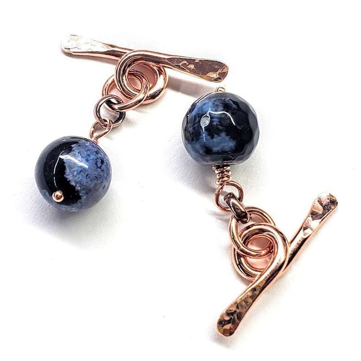 Handcrafted copper cufflinks featuring unique black blue crackle agate beads, symbolizing child abuse awareness with elegant rose gold hammered toggle.