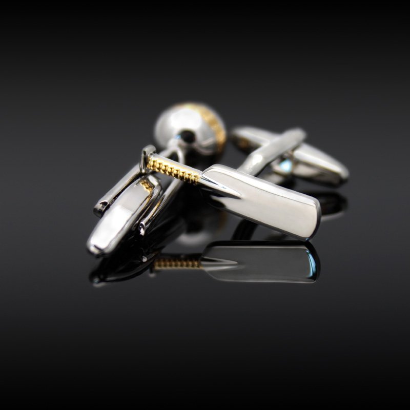 Stylish stainless steel cricket cufflinks with rhodium plating, presented in a luxurious gift box.