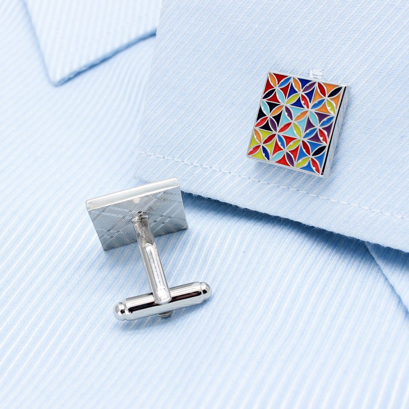 A pair of luxurious Enamel Art Cufflinks made from titanium alloy, featuring vibrant handcrafted enamel designs, presented in a stylish box.