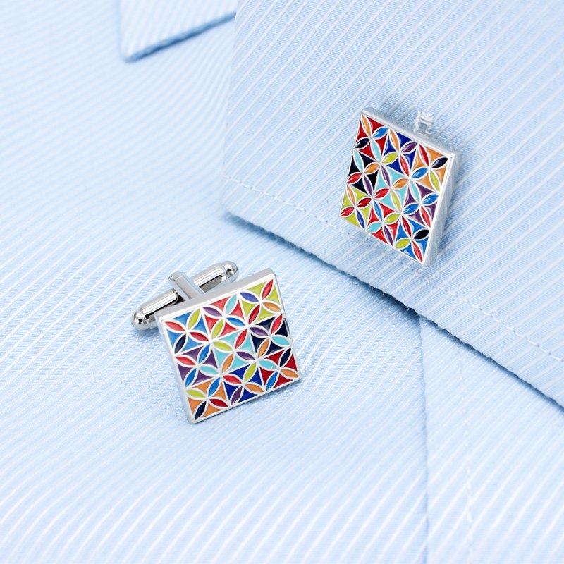 A pair of luxurious Enamel Art Cufflinks made from titanium alloy, featuring vibrant handcrafted enamel designs, presented in a stylish box.