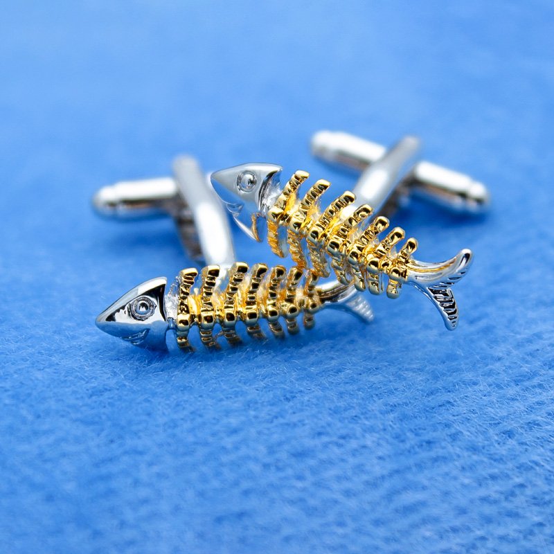 Stylish titanium alloy fish bone cufflinks in a presentation box, showcasing unique design and elegant finish.