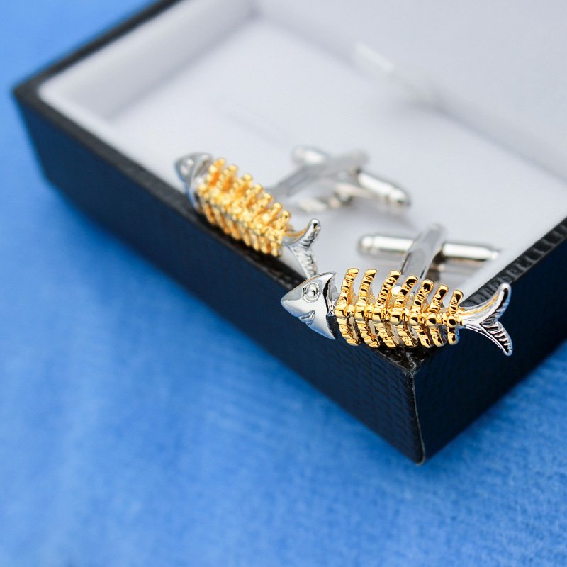 Stylish titanium alloy fish bone cufflinks in a presentation box, showcasing unique design and elegant finish.