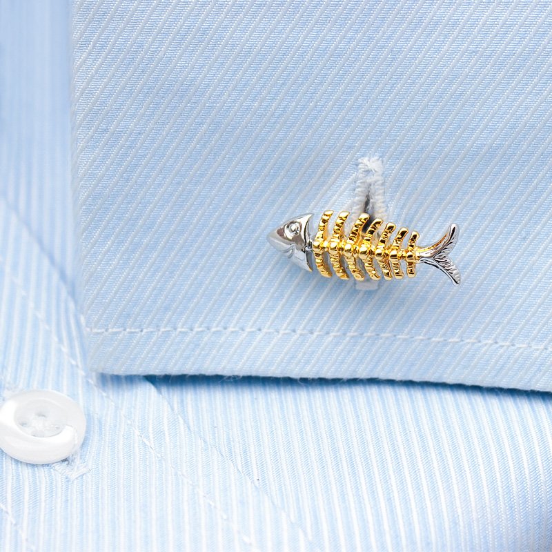 Stylish titanium alloy fish bone cufflinks in a presentation box, showcasing unique design and elegant finish.