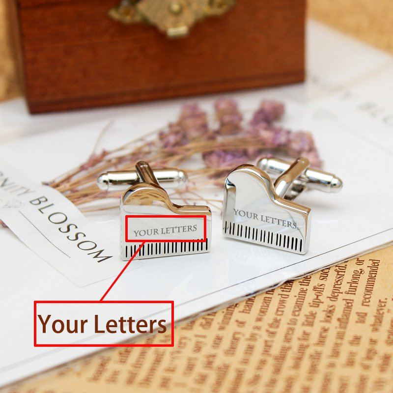 Elegant Grand Piano Cufflinks made from titanium alloy, featuring a polished finish and unique piano design, presented in a luxurious gift box.