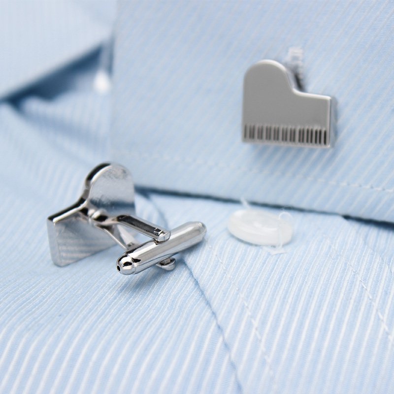 Elegant Grand Piano Cufflinks made from titanium alloy, featuring a polished finish and unique piano design, presented in a luxurious gift box.