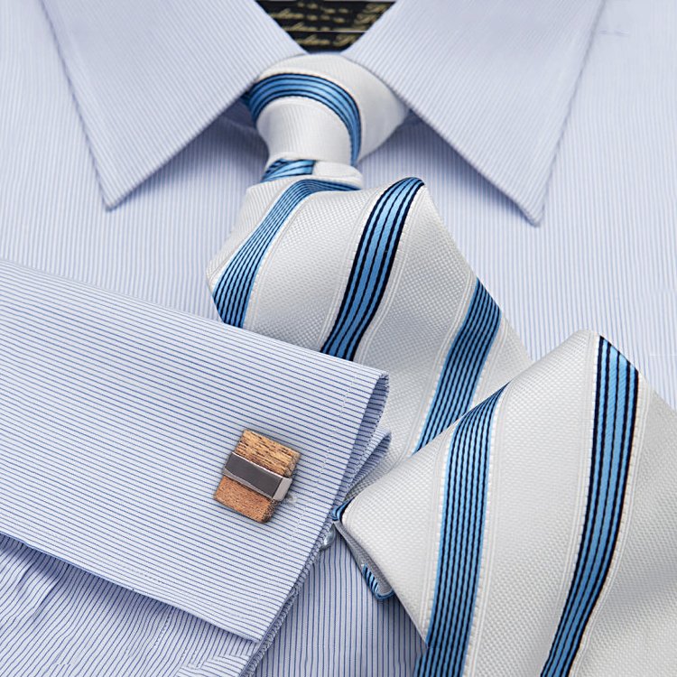 A pair of Luxury Wood Cufflinks featuring a unique wood grain design with stainless steel accents, elegantly displayed in a hard-sided presentation box.