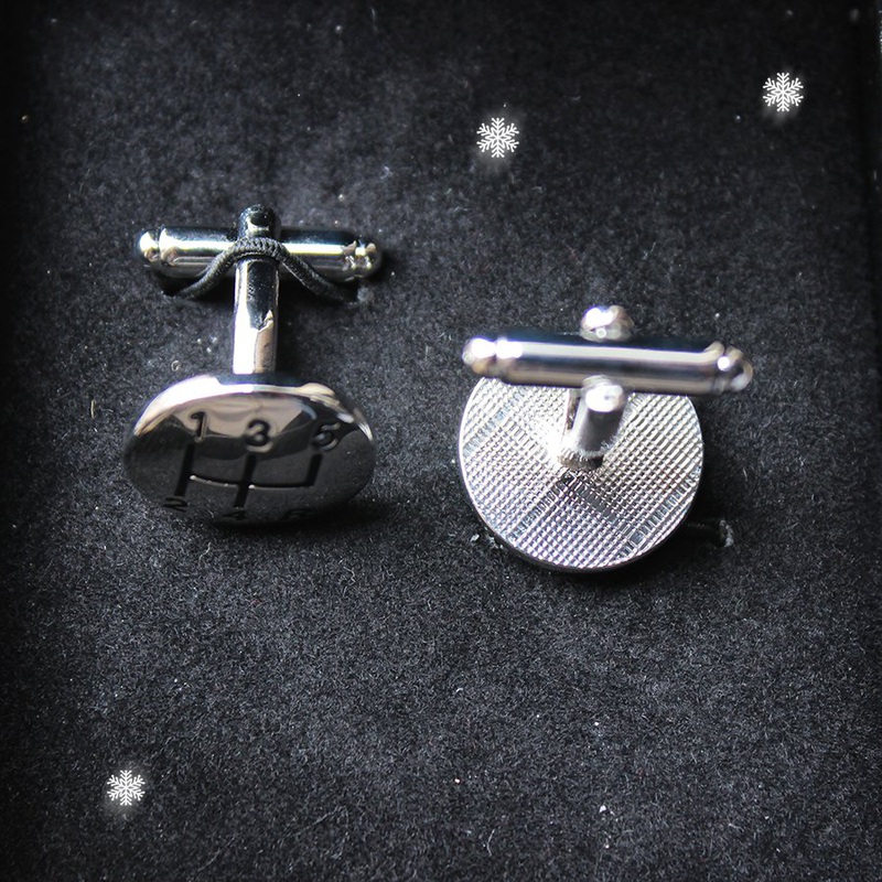 Stylish Manual Transmission Cufflinks made of argentan and rhodium, featuring a detailed gear shift design, presented in a gift box.