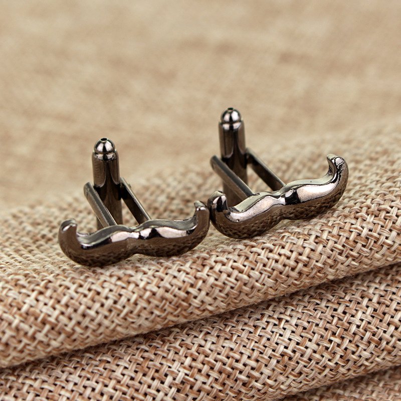 Stylish stainless steel moustache cufflinks with rhodium plating, presented in a hard-sided gift box.