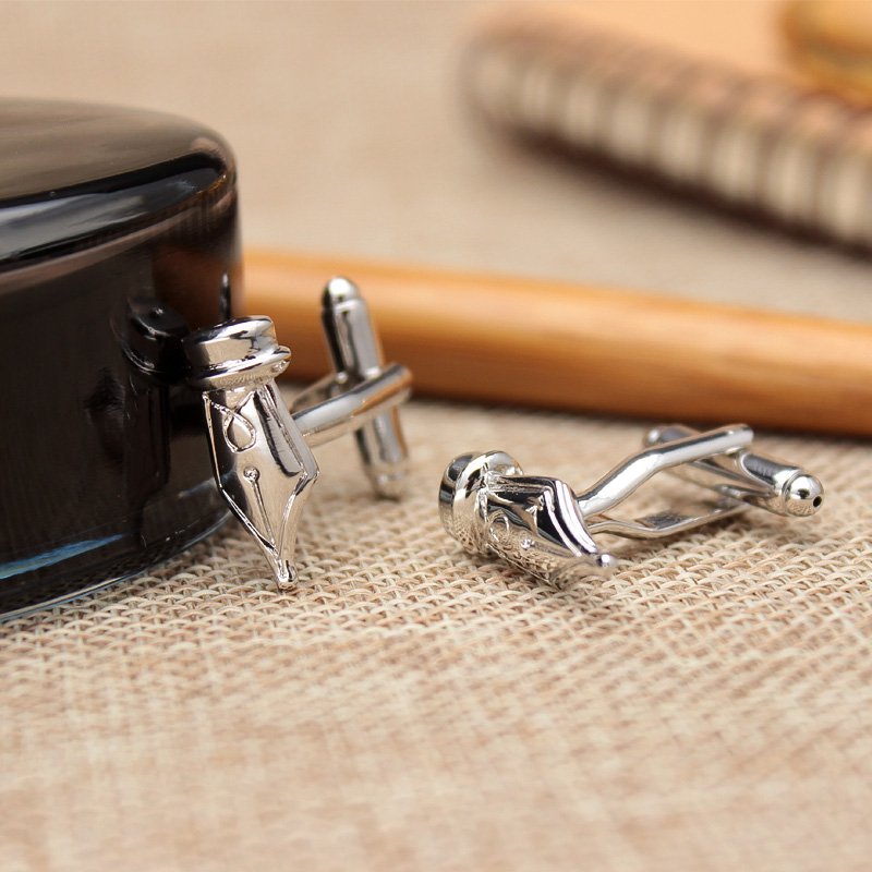 Stylish Pen Nib Cufflinks made from titanium alloy, featuring a unique design perfect for formal wear.