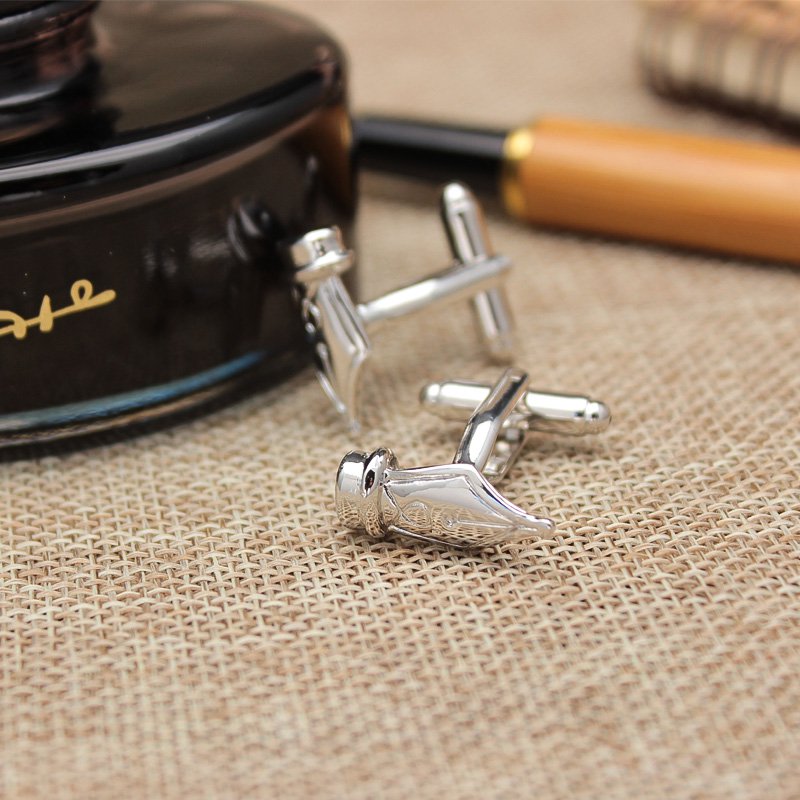 Stylish Pen Nib Cufflinks made from titanium alloy, featuring a unique design perfect for formal wear.