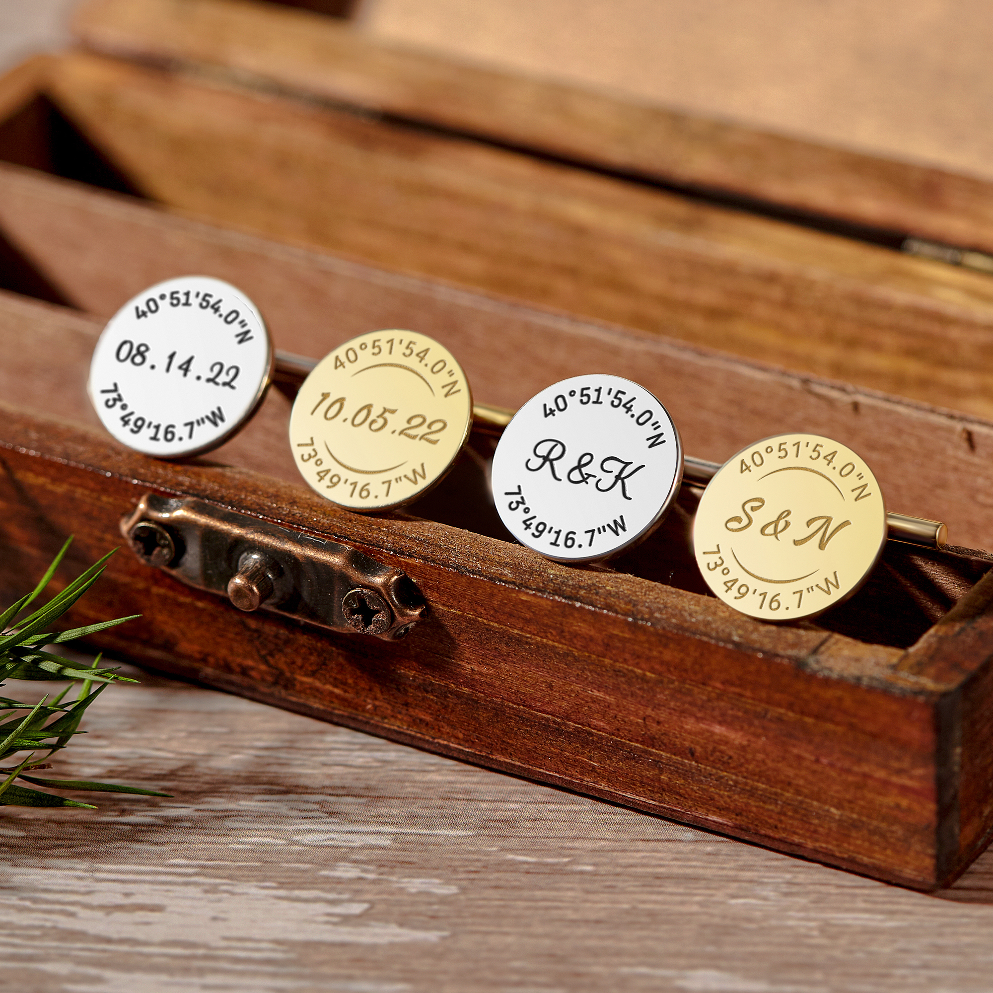 A pair of personalized groom cufflinks made from solid 925 sterling silver, engraved with custom coordinates and initials, elegantly displayed in a gift box.