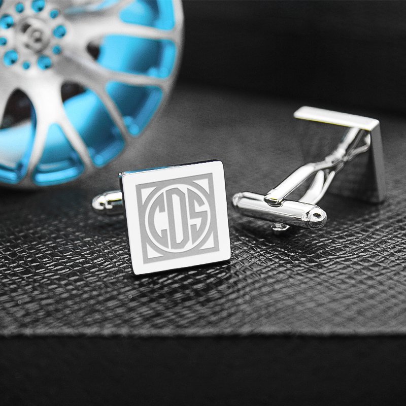 A pair of stylish Personalized Iron Slice Cufflinks made from titanium alloy, featuring a unique design, presented in an elegant hard-sided box.