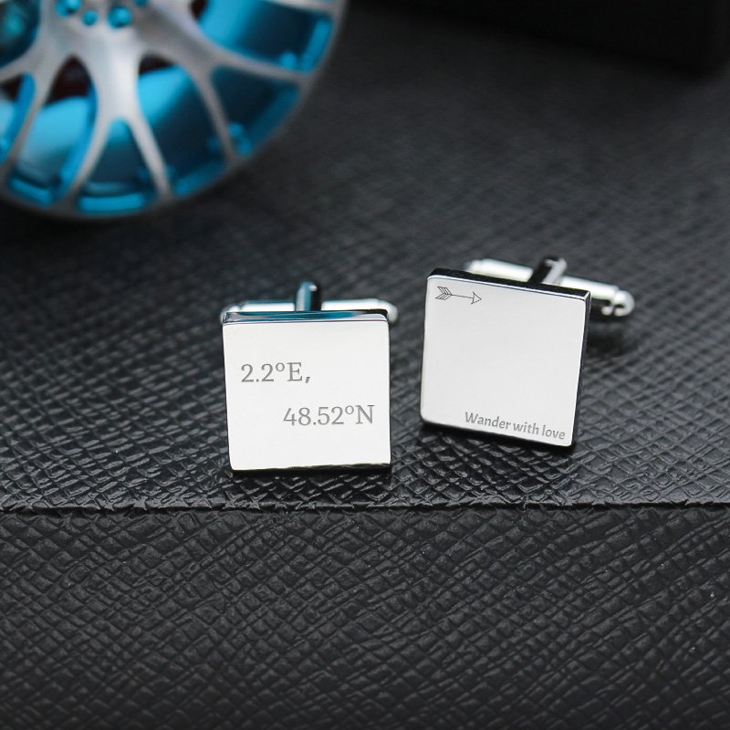 A pair of stylish Personalized Iron Slice Cufflinks made from titanium alloy, featuring a unique design, presented in an elegant hard-sided box.