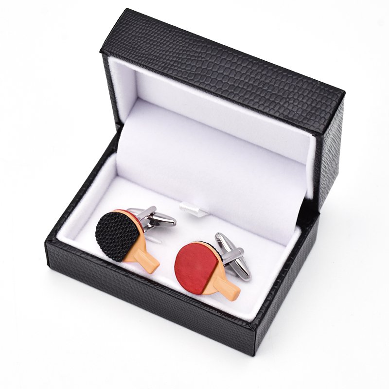 A pair of stylish Ping Pong Paddle Cufflinks made from stainless steel with a hand-painted finish, presented in an elegant gift box.