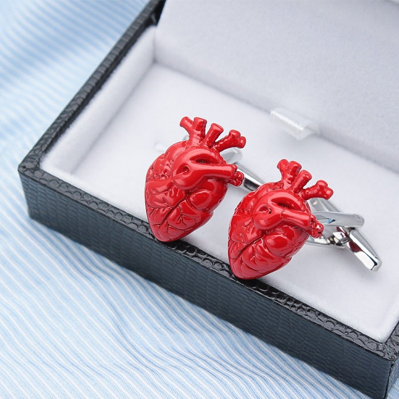 A pair of elegant Red Hearts Cufflinks made from titanium alloy, featuring a vibrant heart design, presented in a stylish hard-sided box.