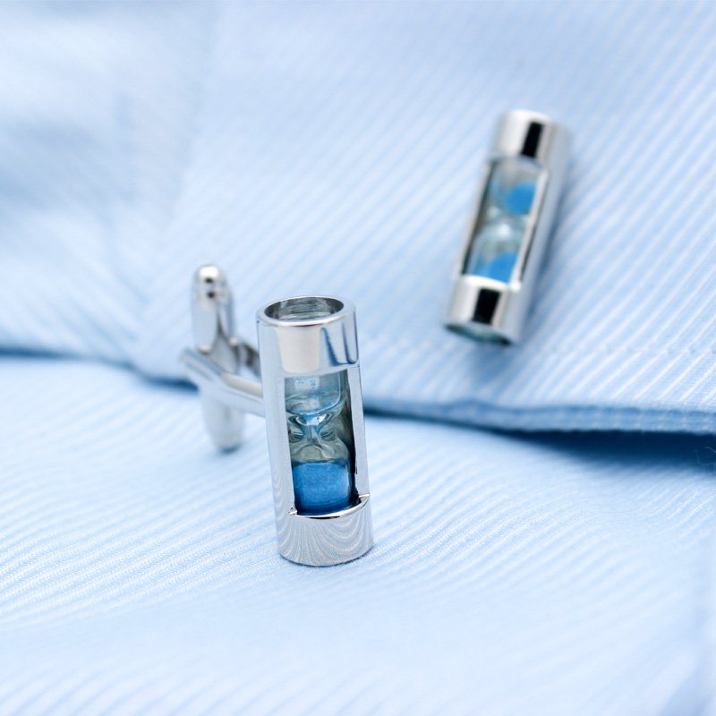 Sandy Clock Cufflinks made of titanium alloy featuring an elegant clock design, presented in a stylish hard-sided box.