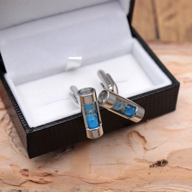 Sandy Clock Cufflinks made of titanium alloy featuring an elegant clock design, presented in a stylish hard-sided box.