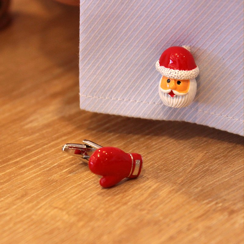 A pair of festive Santa Claus cufflinks featuring red gloves, made of stainless steel and rhodium plated, presented in a stylish gift box.