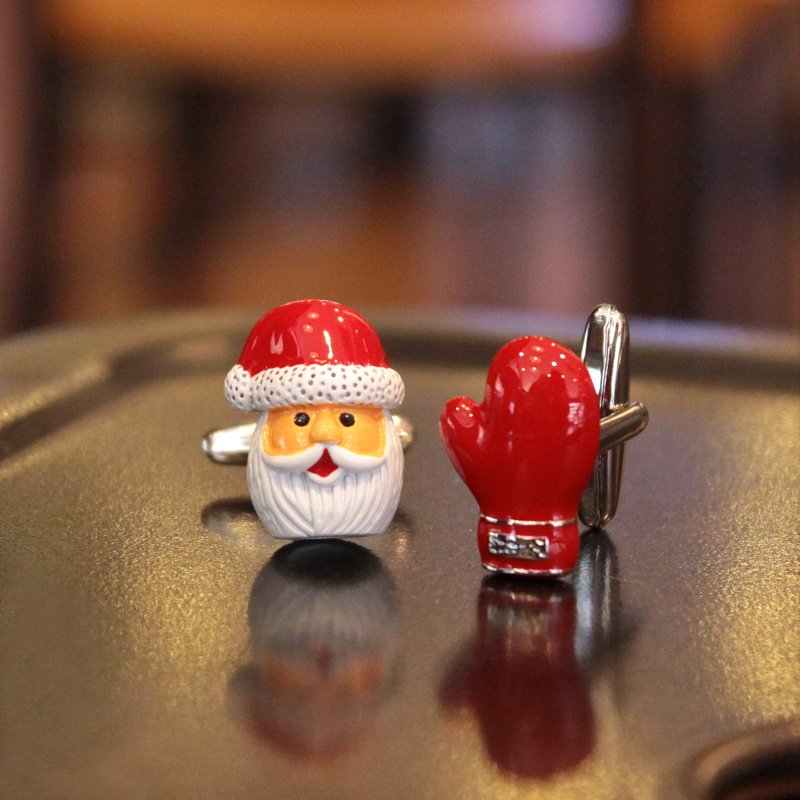 A pair of festive Santa Claus cufflinks featuring red gloves, made of stainless steel and rhodium plated, presented in a stylish gift box.