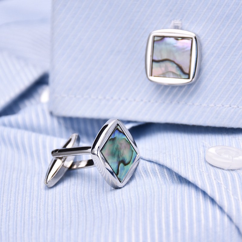 Elegant Sea Shell Cufflinks made from titanium alloy and genuine sea shell, featuring a smooth finish and presented in a stylish gift box.