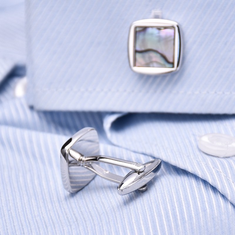 Elegant Sea Shell Cufflinks made from titanium alloy and genuine sea shell, featuring a smooth finish and presented in a stylish gift box.