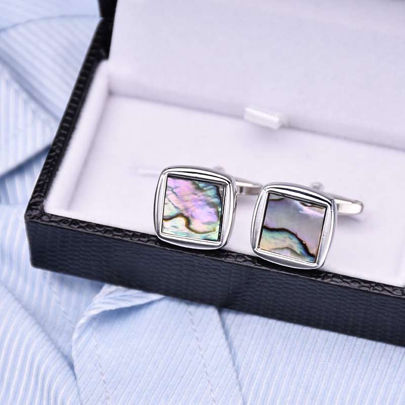 Elegant Sea Shell Cufflinks made from titanium alloy and genuine sea shell, featuring a smooth finish and presented in a stylish gift box.