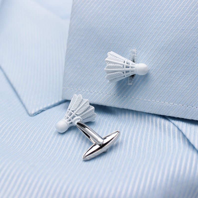 A pair of elegant Shuttlecock Cufflinks made from titanium alloy, featuring a polished finish and unique shuttlecock design, presented in a stylish gift box.