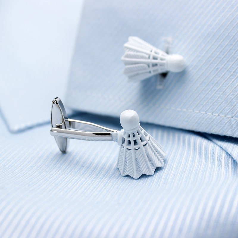 A pair of elegant Shuttlecock Cufflinks made from titanium alloy, featuring a polished finish and unique shuttlecock design, presented in a stylish gift box.