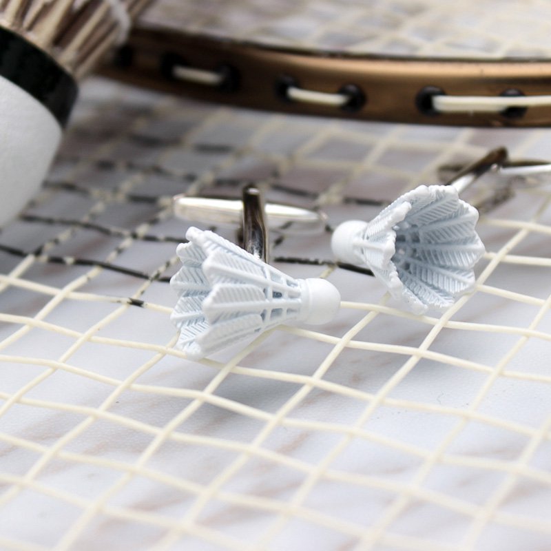 A pair of elegant Shuttlecock Cufflinks made from titanium alloy, featuring a polished finish and unique shuttlecock design, presented in a stylish gift box.