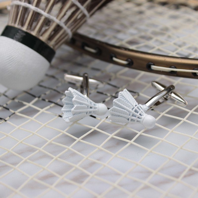 A pair of elegant Shuttlecock Cufflinks made from titanium alloy, featuring a polished finish and unique shuttlecock design, presented in a stylish gift box.