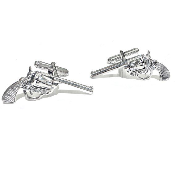 A pair of stylish silver revolver cufflinks made from bronze and rhodium plated, displayed in a hard-sided presentation box.