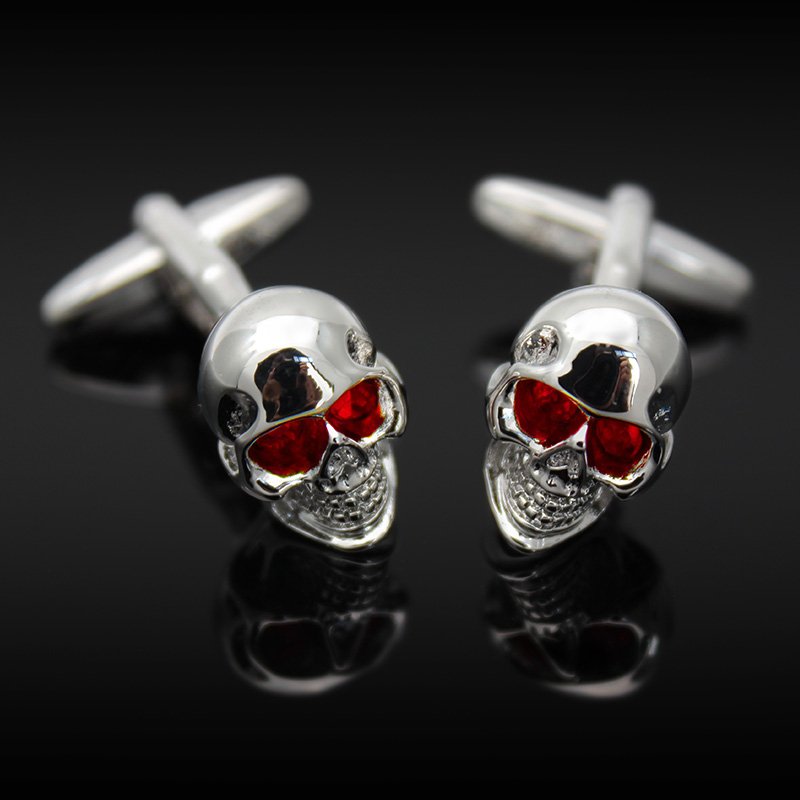 Stylish skull cufflinks made of stainless steel with rhodium plating, presented in a hard-sided gift box.