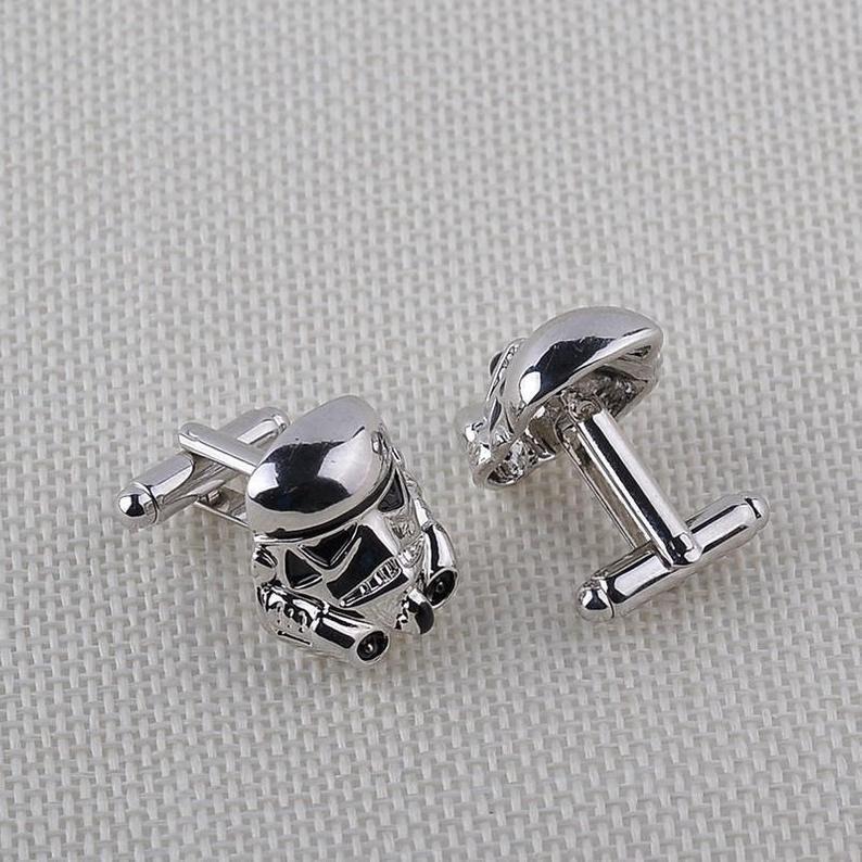 Star Wars cufflinks made of bronze with chrome-plating, featuring a sleek design, presented in a luxury box.