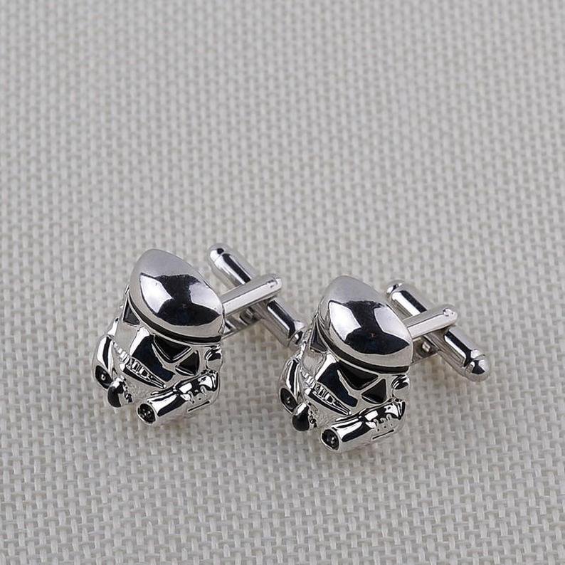 Star Wars cufflinks made of bronze with chrome-plating, featuring a sleek design, presented in a luxury box.