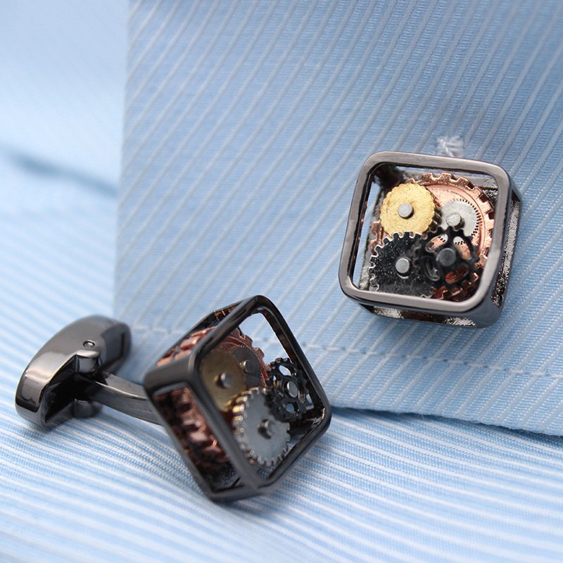 A pair of stylish Steampunk Gears Cufflinks made from stainless steel with intricate gear designs, presented in a hard-sided gift box.